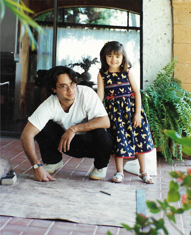 Carlos Luna and his daughter Camila examining amate paper, Atlixco, Mexico 1997