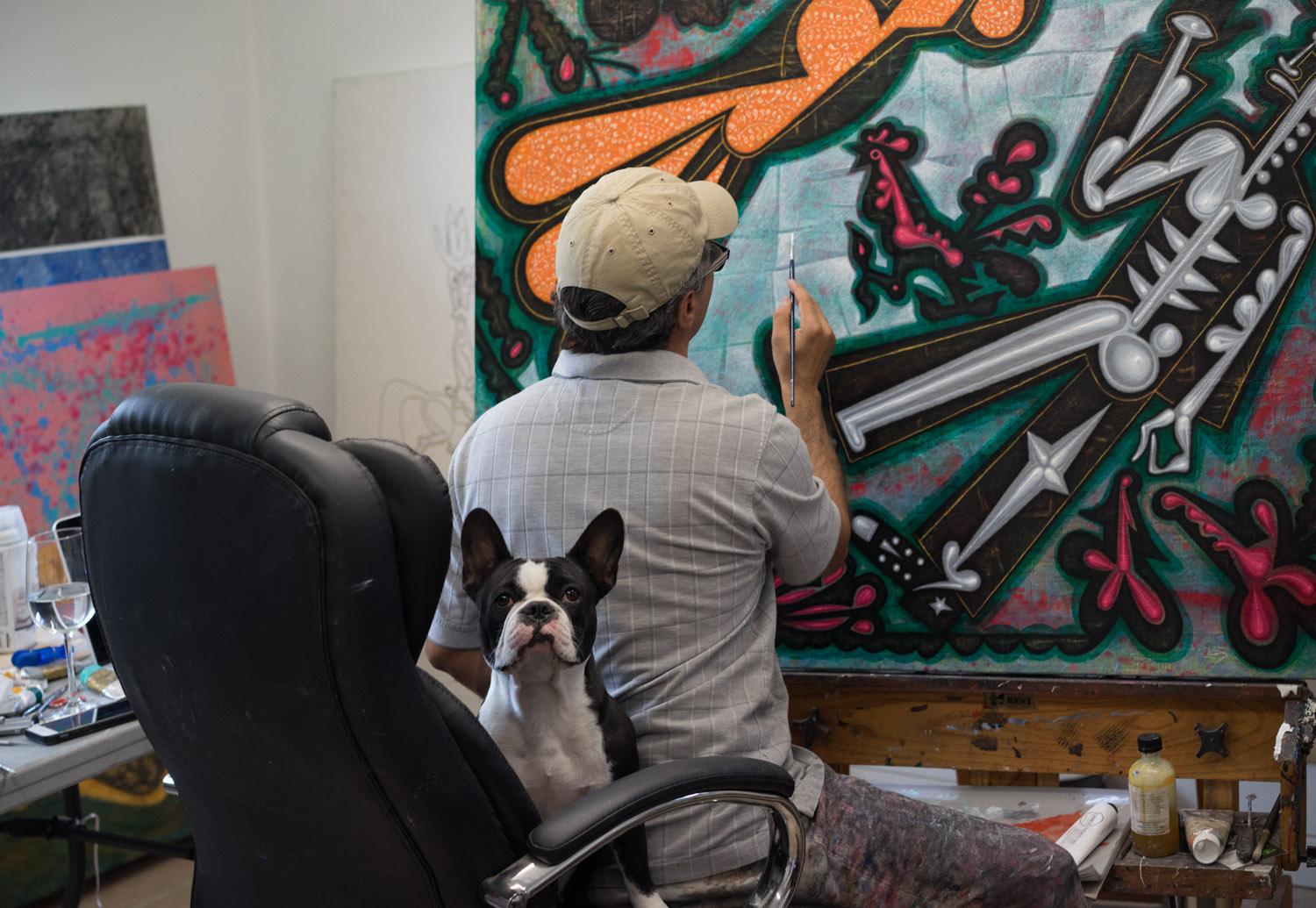 Carlos Luna working with his dog Cocoa, 2018